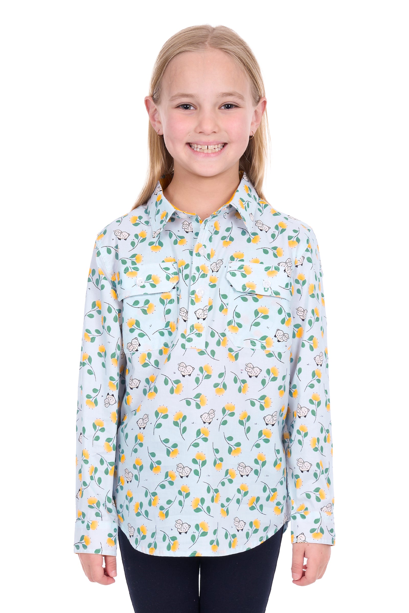 Young girl wearing a floral patterned shirt on a white background