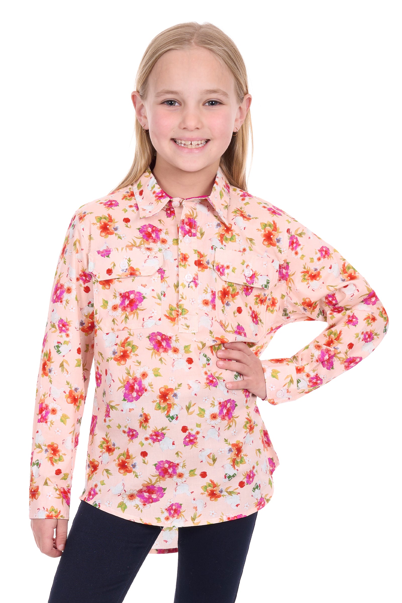Young girl wearing a floral long-sleeve shirt on a white background