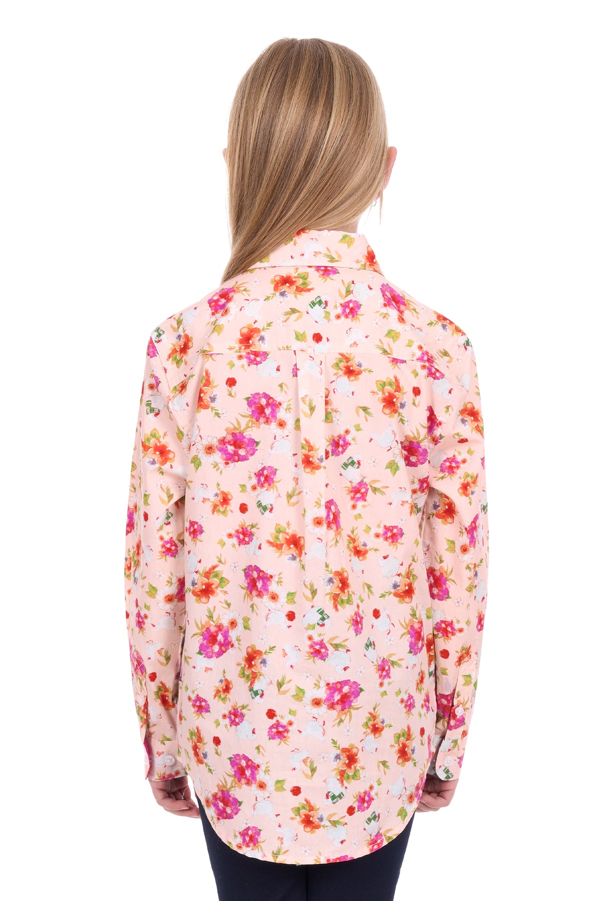 Woman wearing a floral patterned shirt on a white background