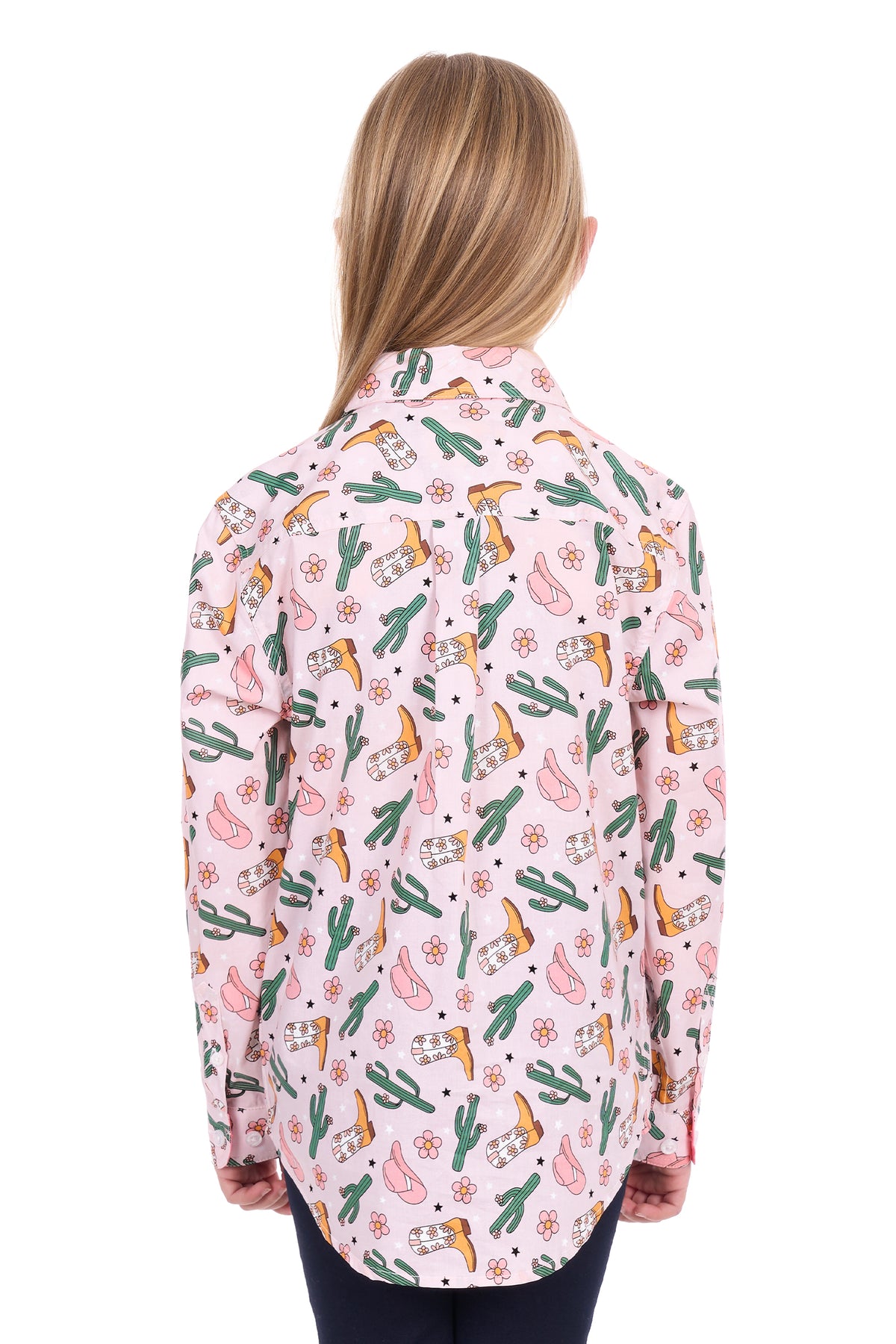 Woman wearing a pink shirt with cactus pattern on a white background