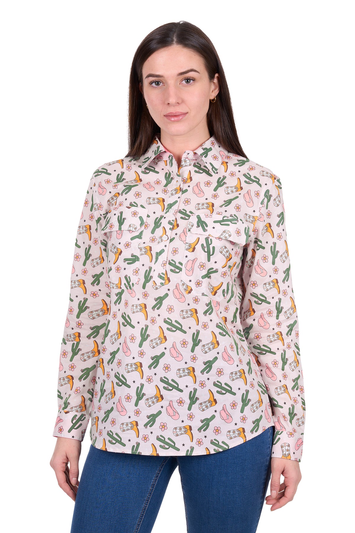 Woman wearing a floral patterned shirt with cacti and parrots on a white background