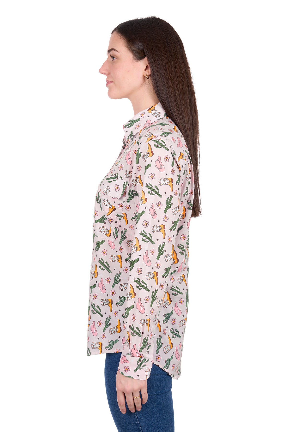 Woman wearing a floral and cactus patterned shirt on a white background