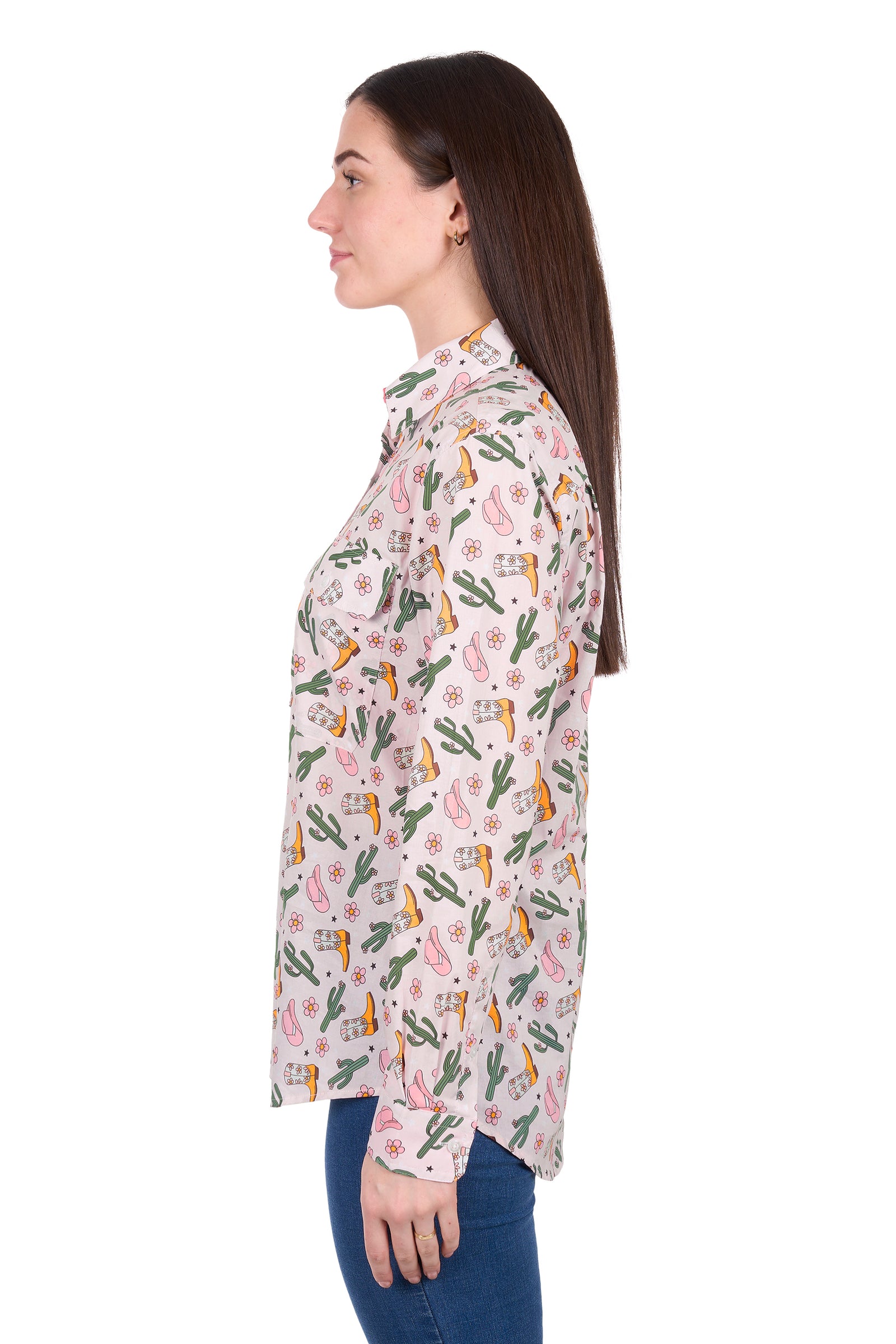 Woman wearing a floral and cactus patterned shirt on a white background