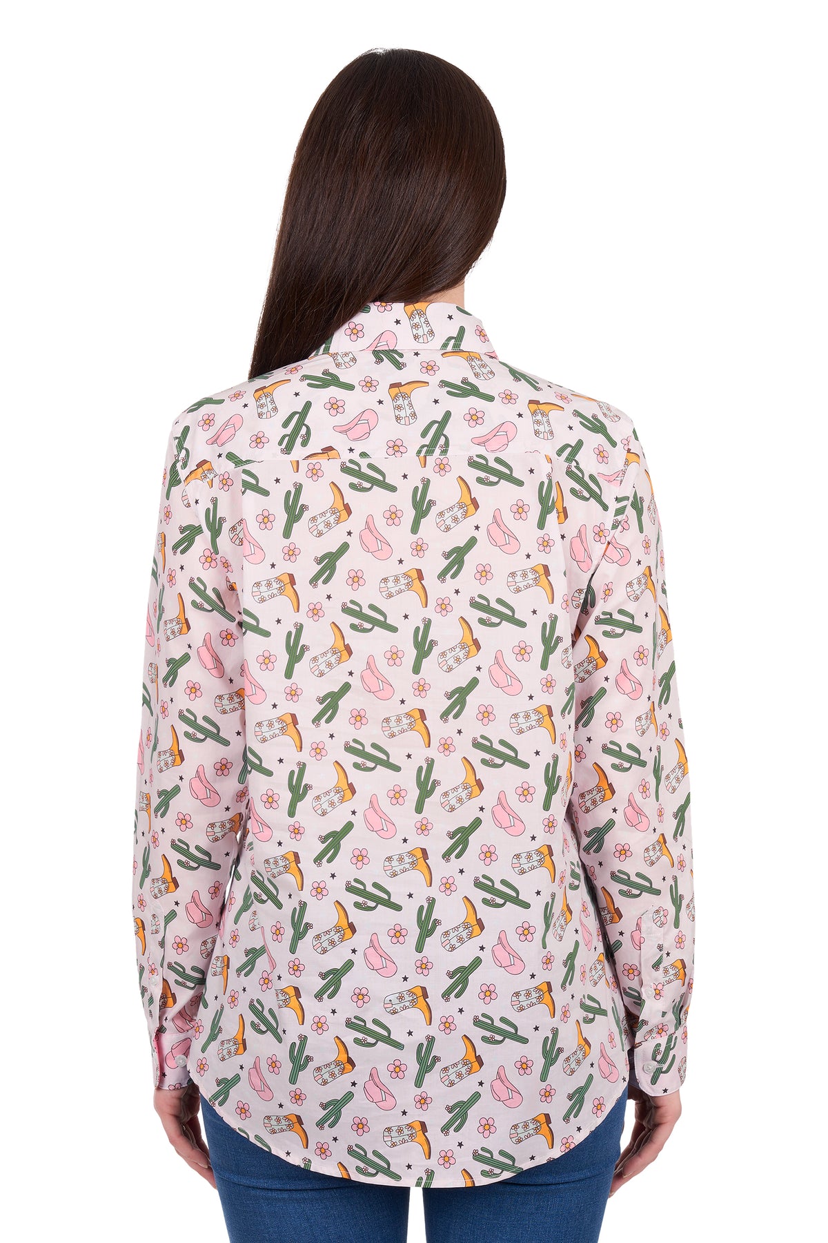 Woman wearing a floral patterned shirt with cacti and flowers on a white background
