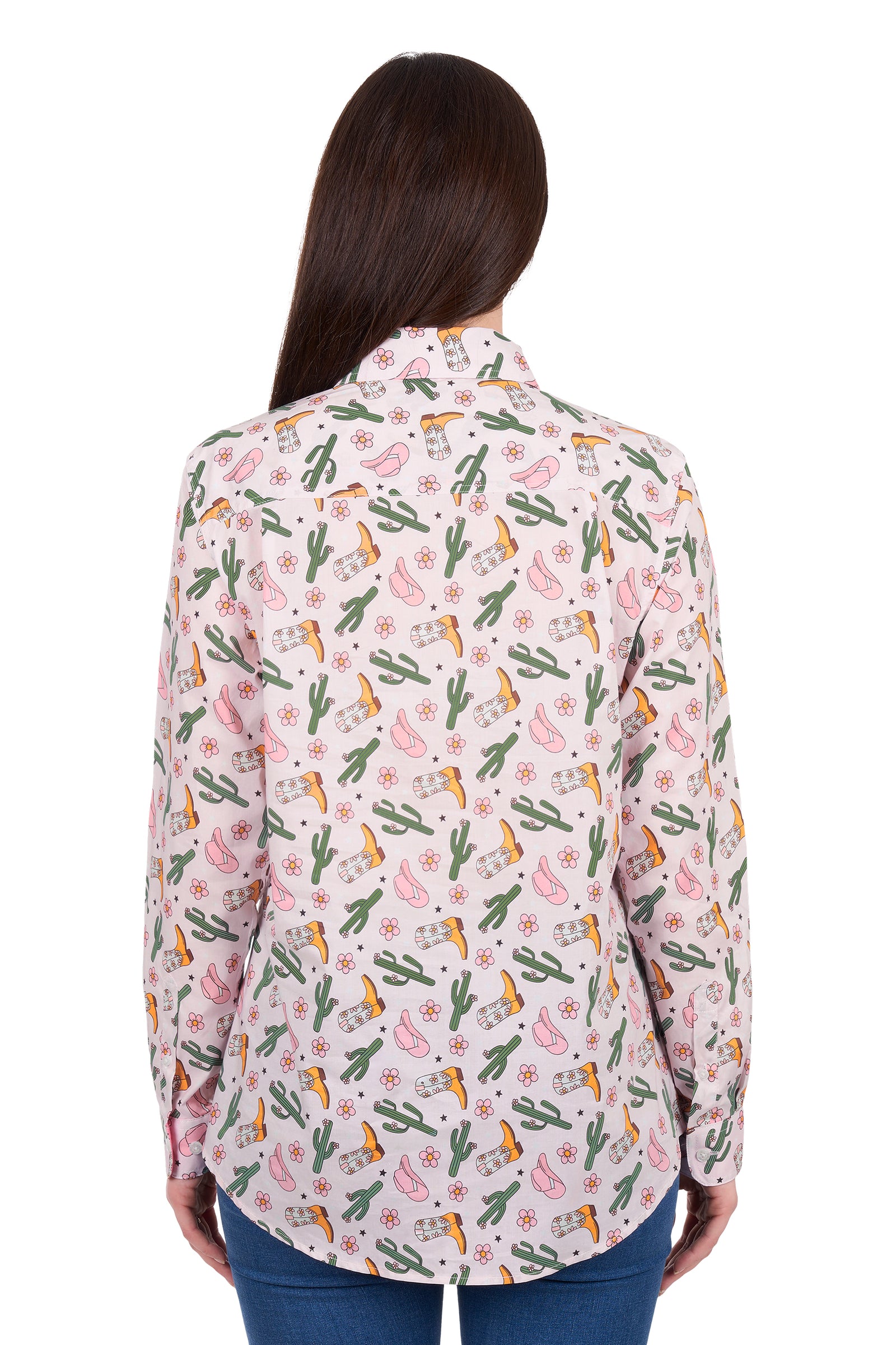 Woman wearing a floral patterned shirt with cacti and flowers on a white background
