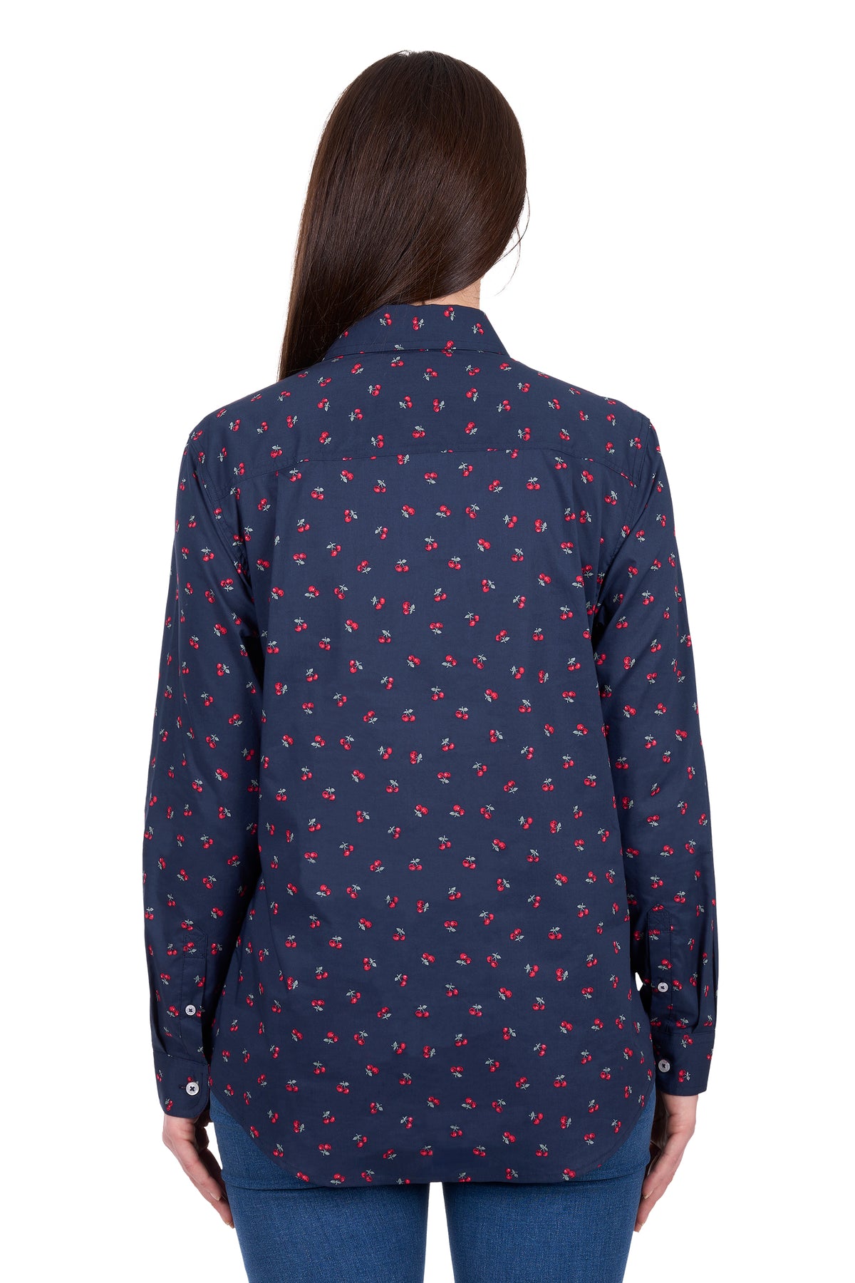 Woman wearing a navy blue shirt with a subtle pattern on a white background