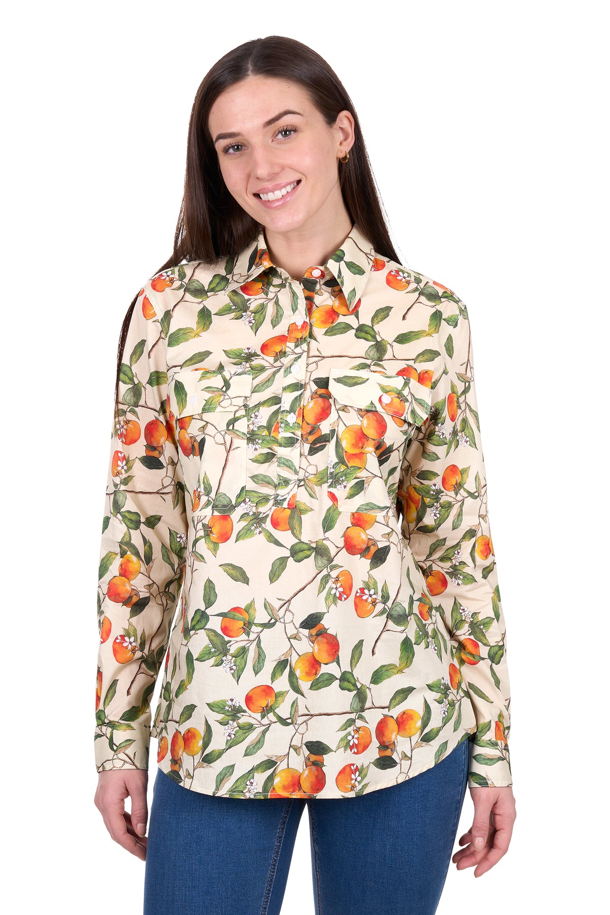 Woman wearing a long-sleeve shirt with a peach pattern on a white background