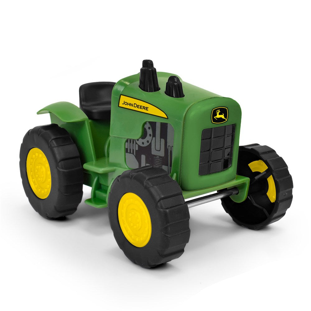 Toy tractor with John Deere logo on a white background