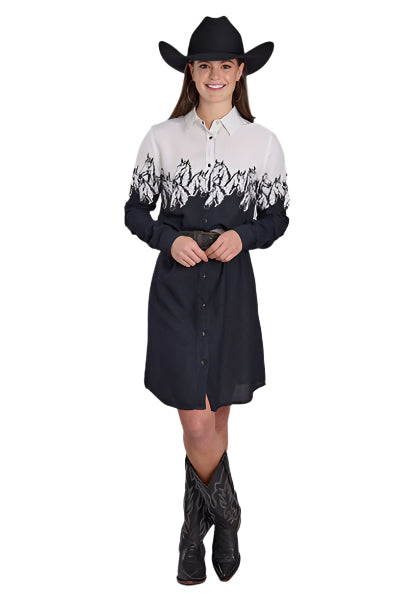 Roper Women's Five Star L/S Dress. A woman wearing a long sleeve black and white dress with a flame pattern, paired with a cowboy hat and black boots.