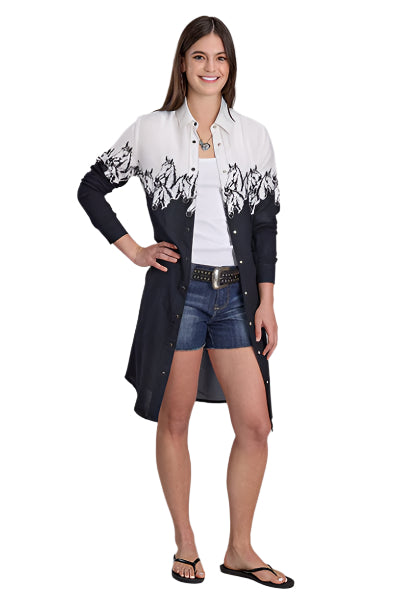 Roper Women's Five Star L/S Dress. Woman wearing a black and white patterned shirt with a white top and denim shorts on a white background.