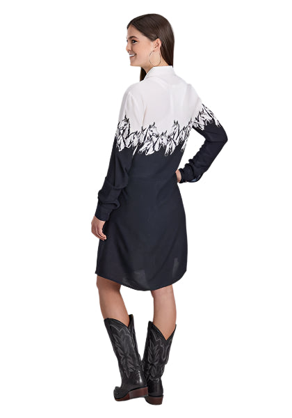 Roper Women's Five Star L/S Dress. Woman wearing a black and white dress with mountain design, standing against a plain background.