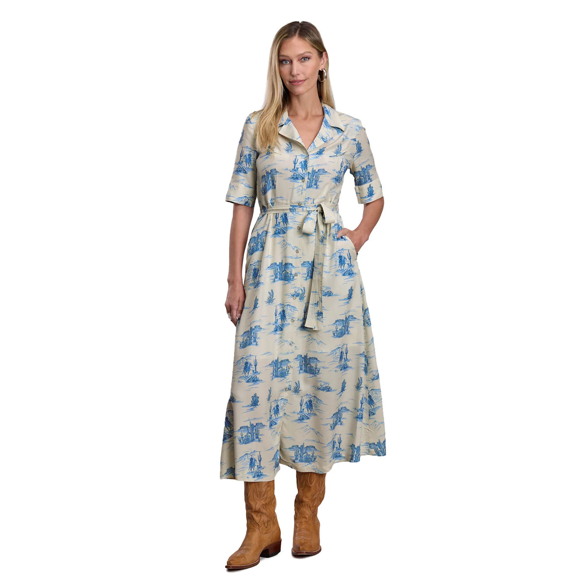 Woman wearing a patterned dress with a belt on a white background