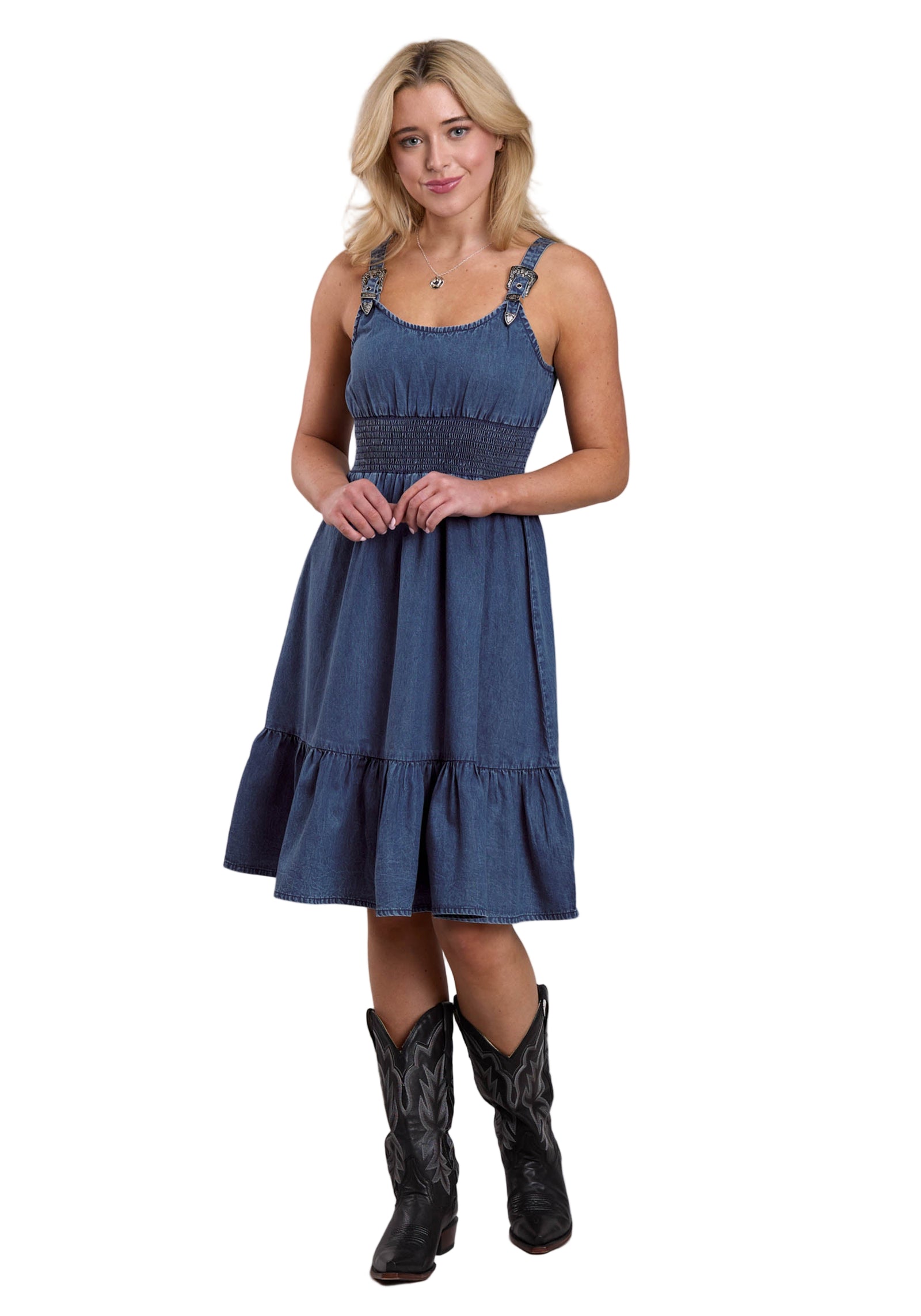 Roper Women's Five Star Collection Dress. Woman wearing a blue dress and black cowboy boots on a gray background