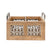 Handcrafted Mango Wood Cutlery Storage. Wooden basket with metal handles and decorative cut-out patterns on a white background