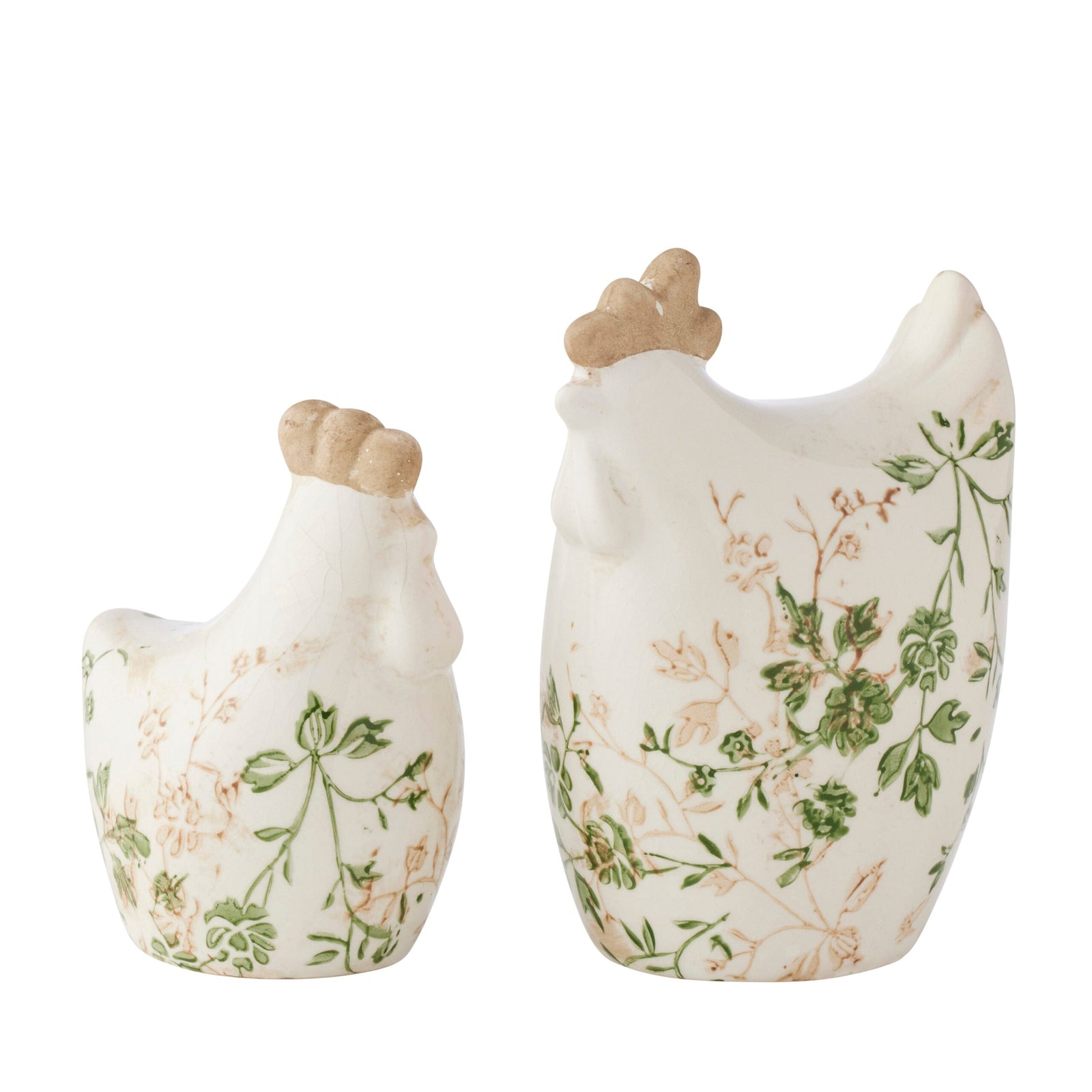Two ceramic chicken figurines with floral patterns on a white background