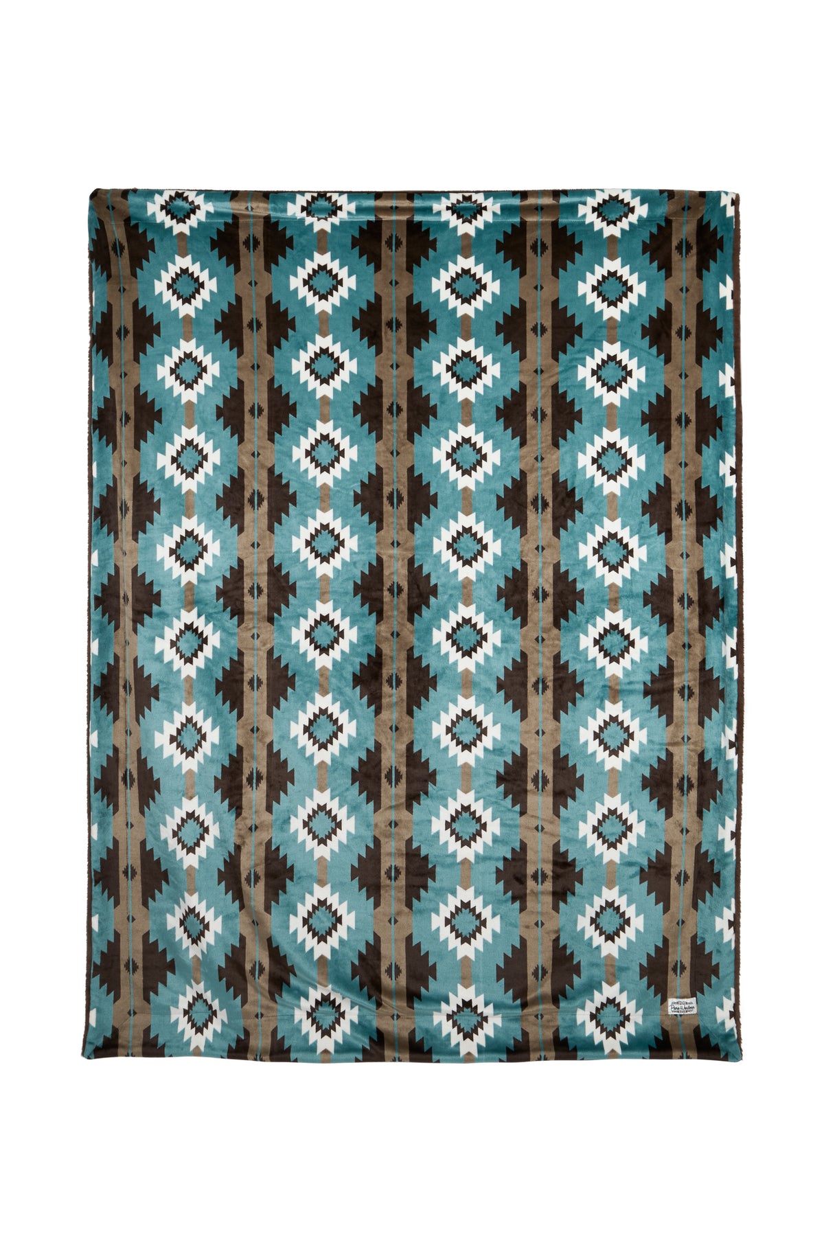 Patterned blanket with blue, brown, and white design on a white background