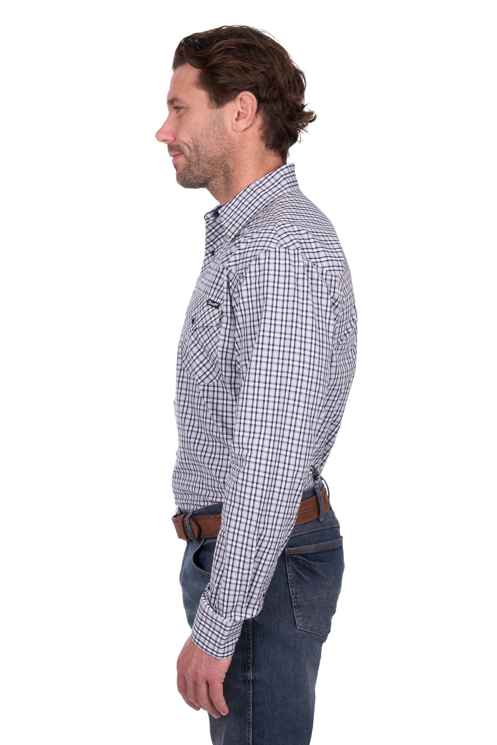 Man wearing a checkered shirt and jeans on a white background