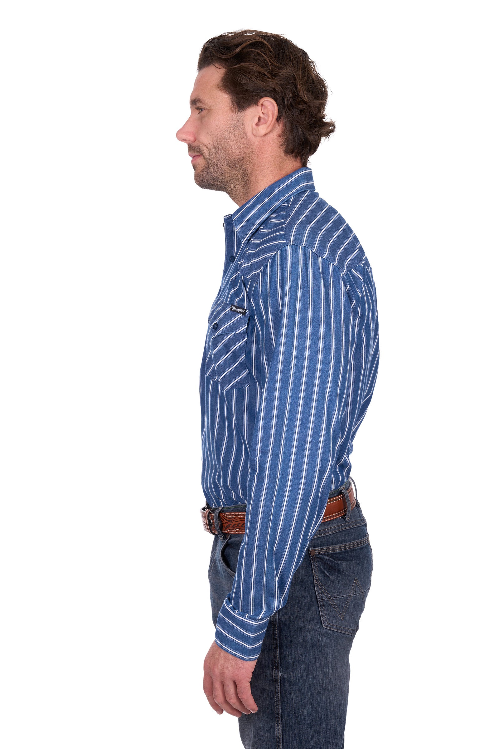 Man wearing a blue striped shirt and jeans on a white background