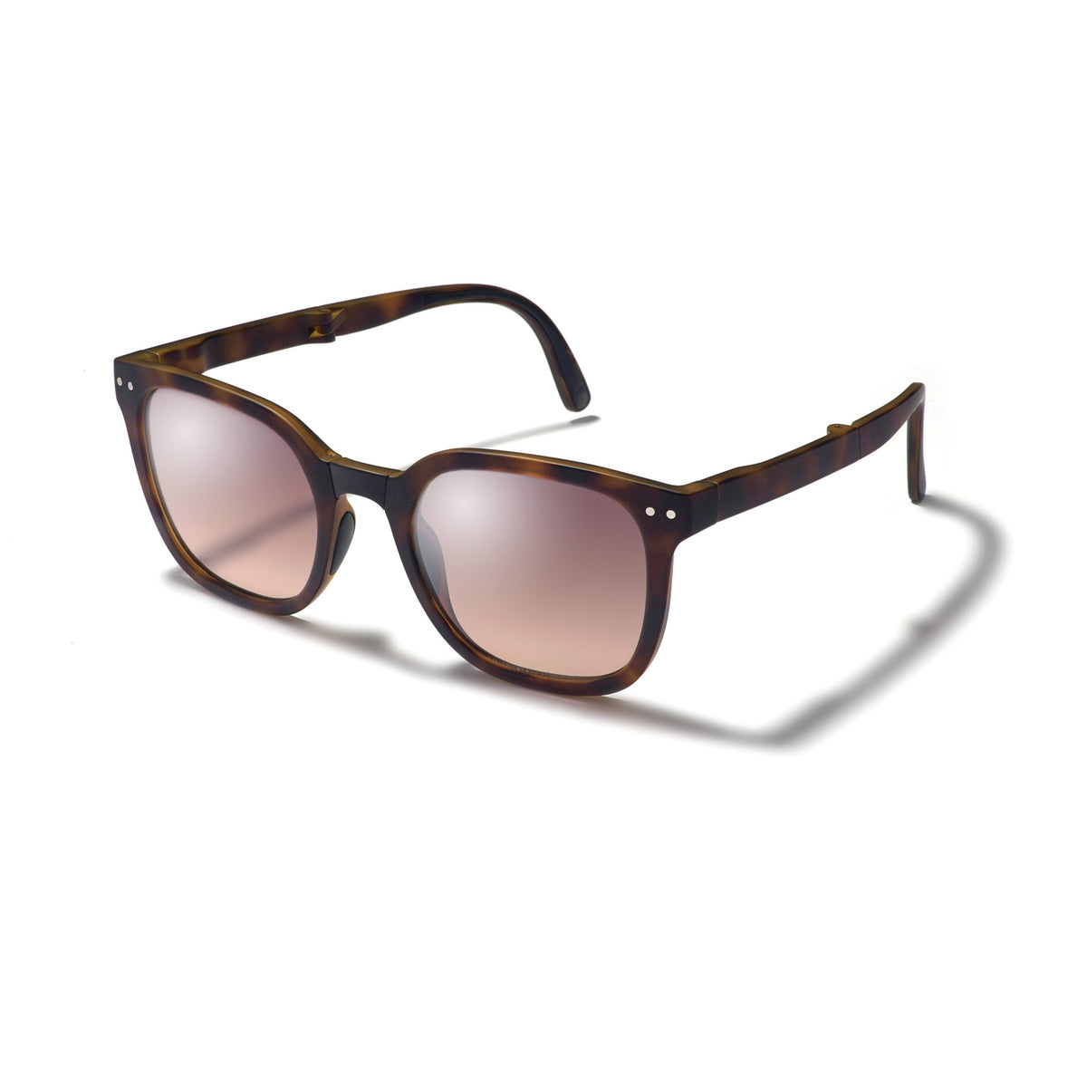 Sunglasses with tortoiseshell frame and gradient lenses on a white background