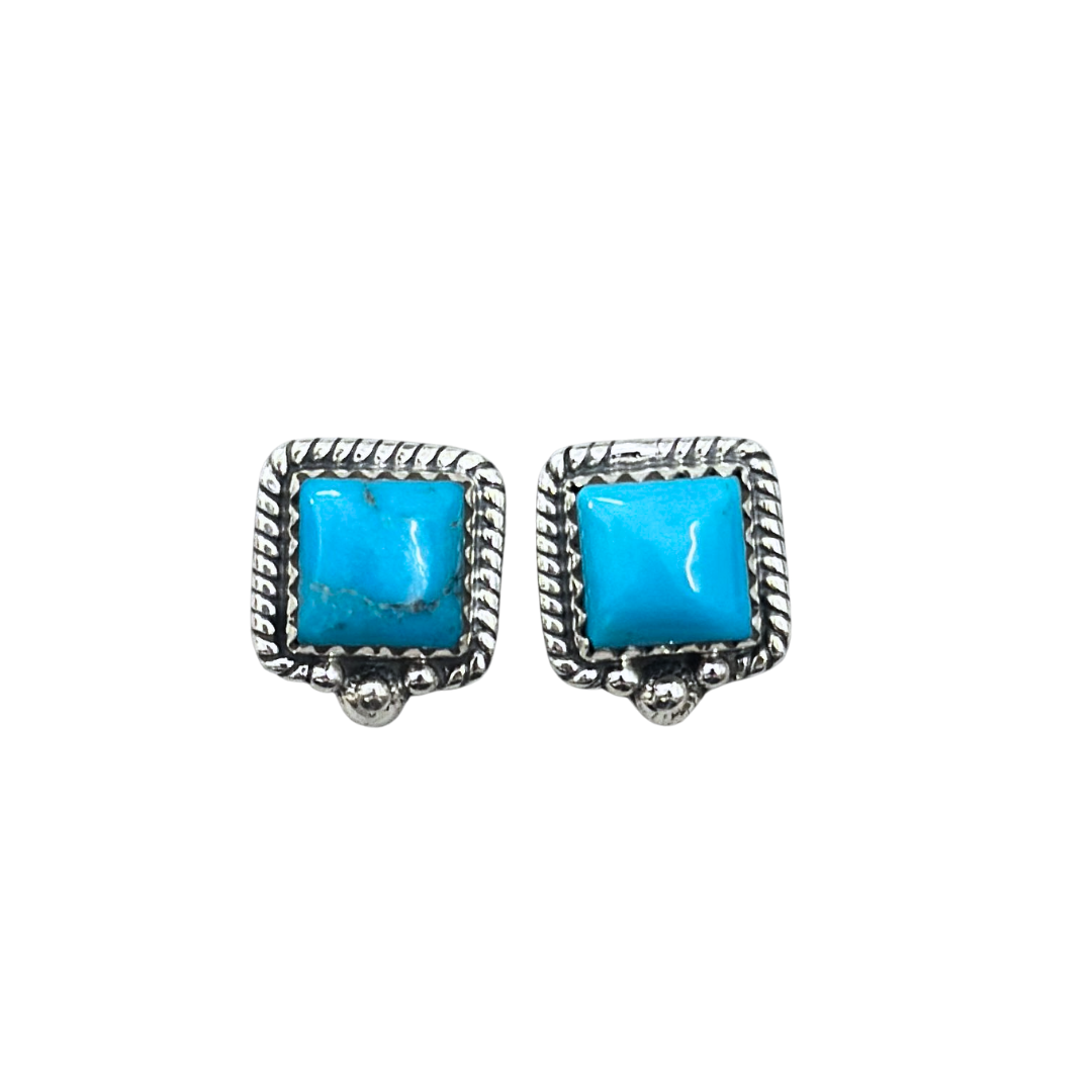 Wild Brumby Co Brumby Heritage Stud Earrings. Pair of square turquoise stone earrings with silver frames on a white background