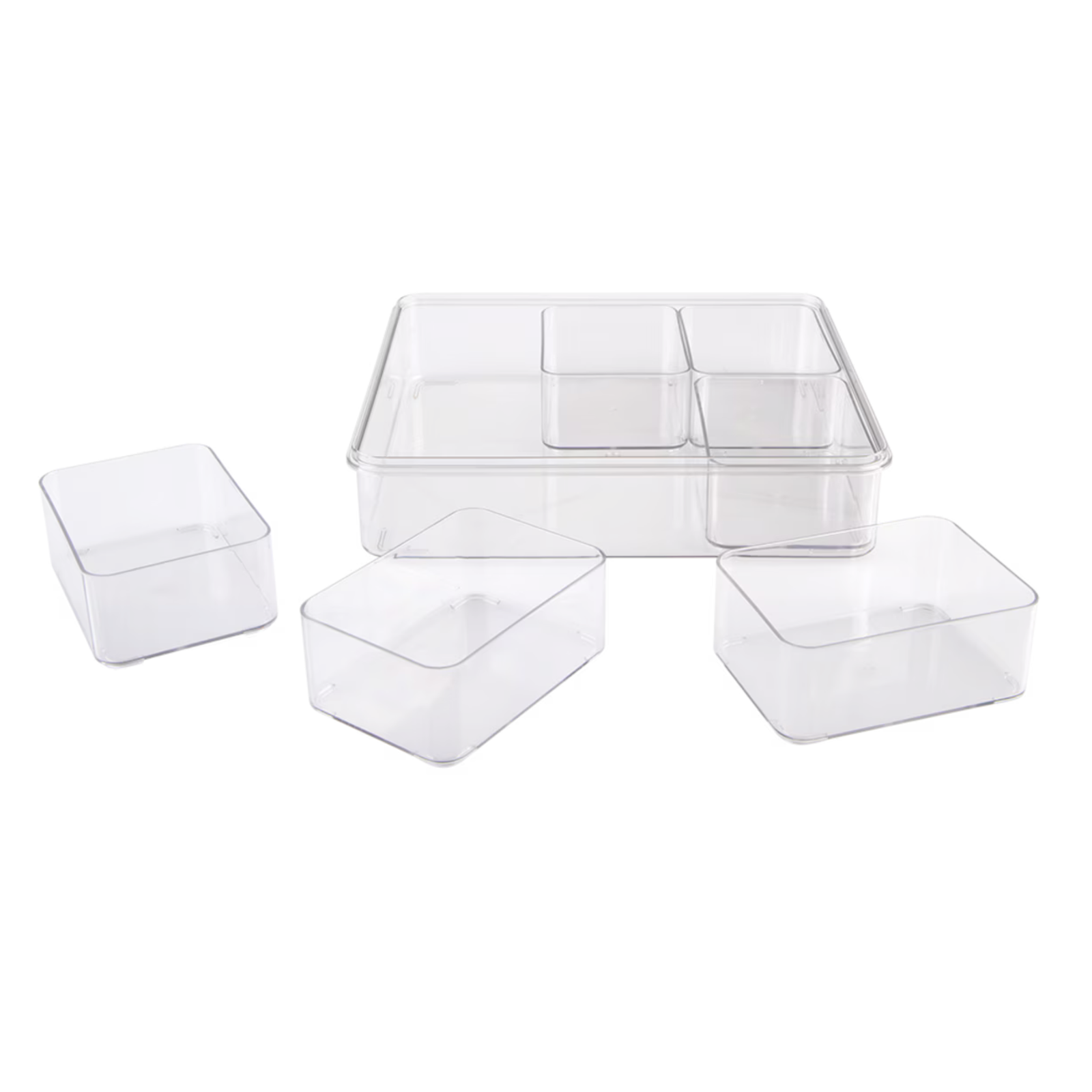 Four clear plastic organizer containers in different sizes, including one larger rectangular container with four small compartments and three smaller square containers, shown on a white background.