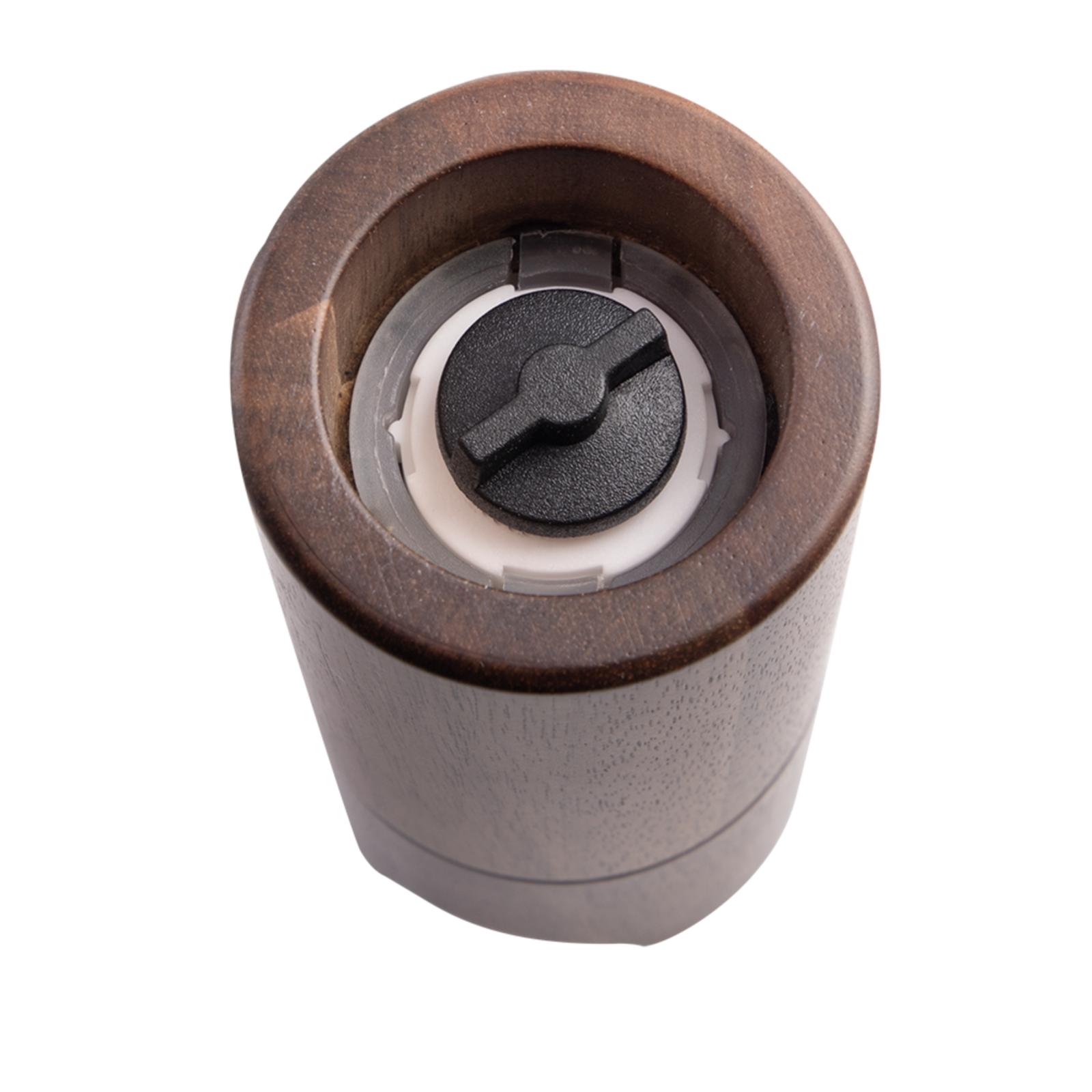 A close-up top-down view of a cylindrical wooden container or grinder with a dark brown wood finish, a black top knob, and a white inner ring, isolated on a white background.