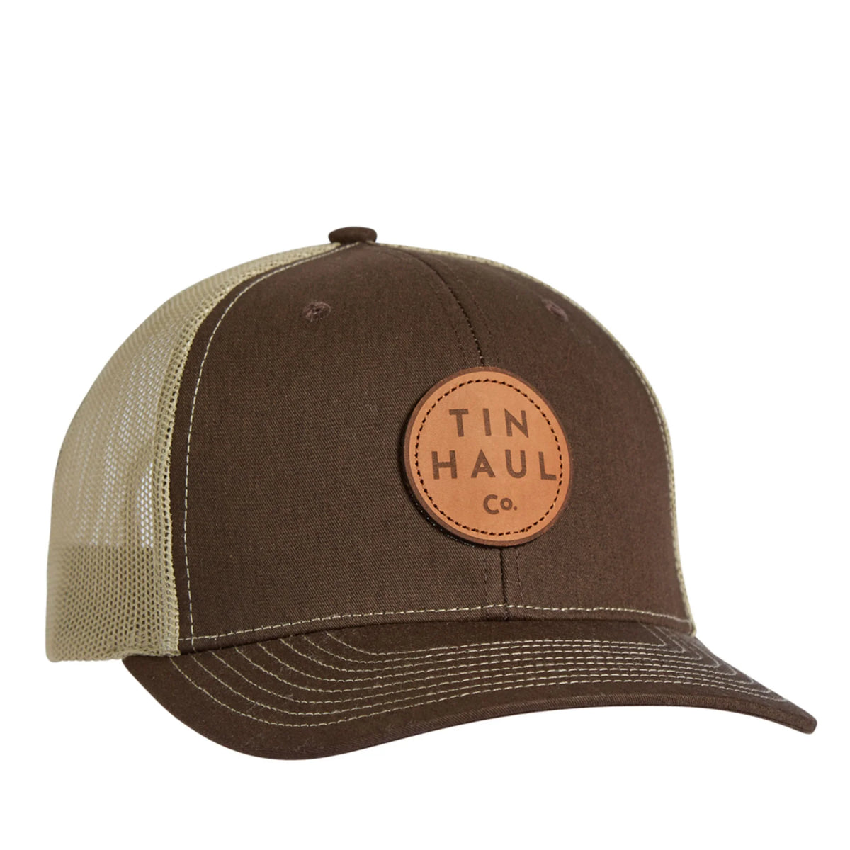 Brown and beige cap with a leather patch featuring 'Tin Haul Co.' on a white background