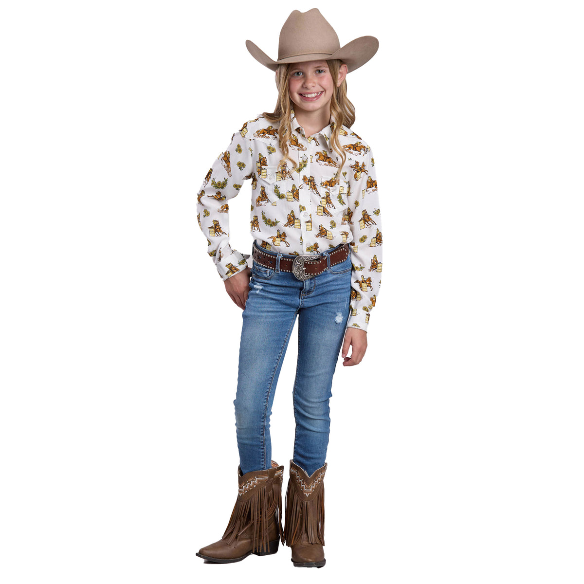 Young girl in cowboy outfit with patterned shirt, jeans, and boots on a white background