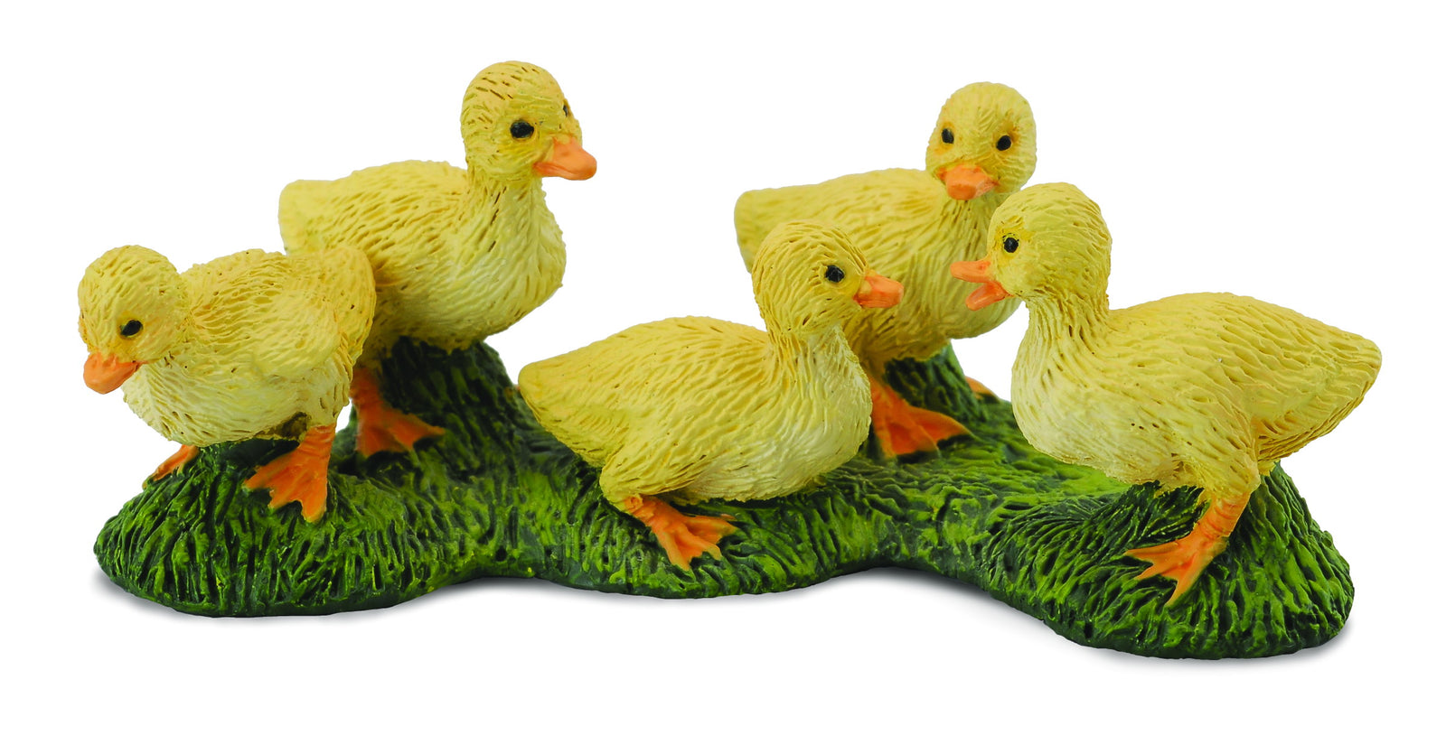 Set of six yellow ducklings on a green base
