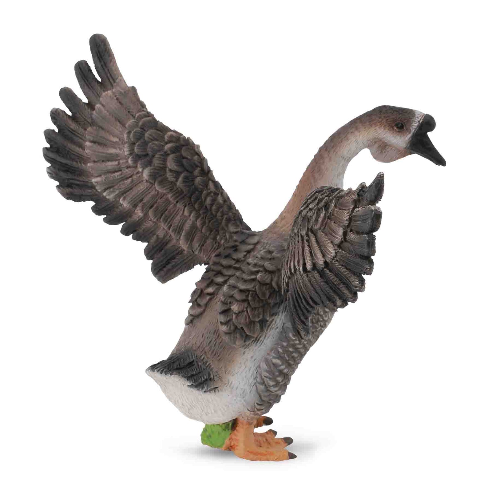 Toy goose figurine with open wings on a white background