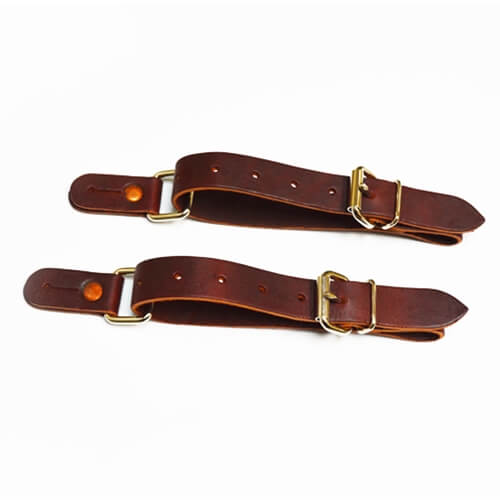 Barstow Junior Leather Spur Straps. A pair of brown leather spur straps with metal buckles and solid copper rivets.