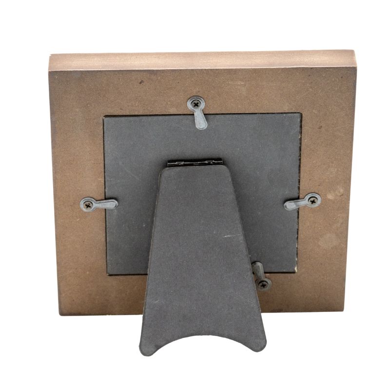 Designer Photo Frame. Wooden frame with a metal bracket on a white background