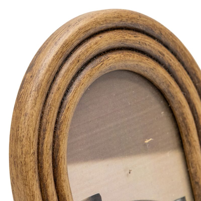 4×6″ Contemporary Arch Style Photo Frame. Close-up of a wooden picture frame with a white background
