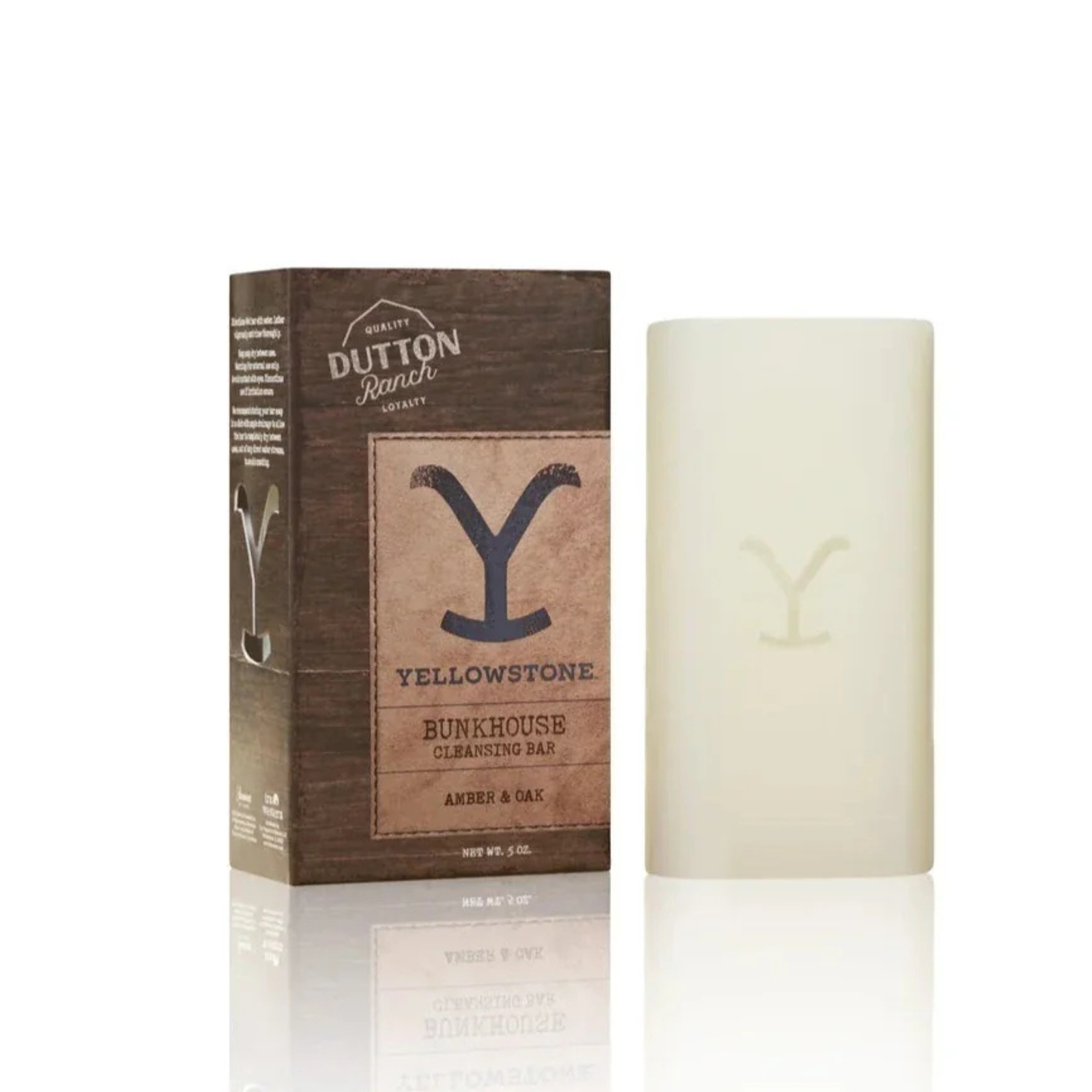 Tru Western Yellowstone Bunkhouse Cleansing Bar Soap. Yellowstone Bunkhouse candle and packaging on a white background