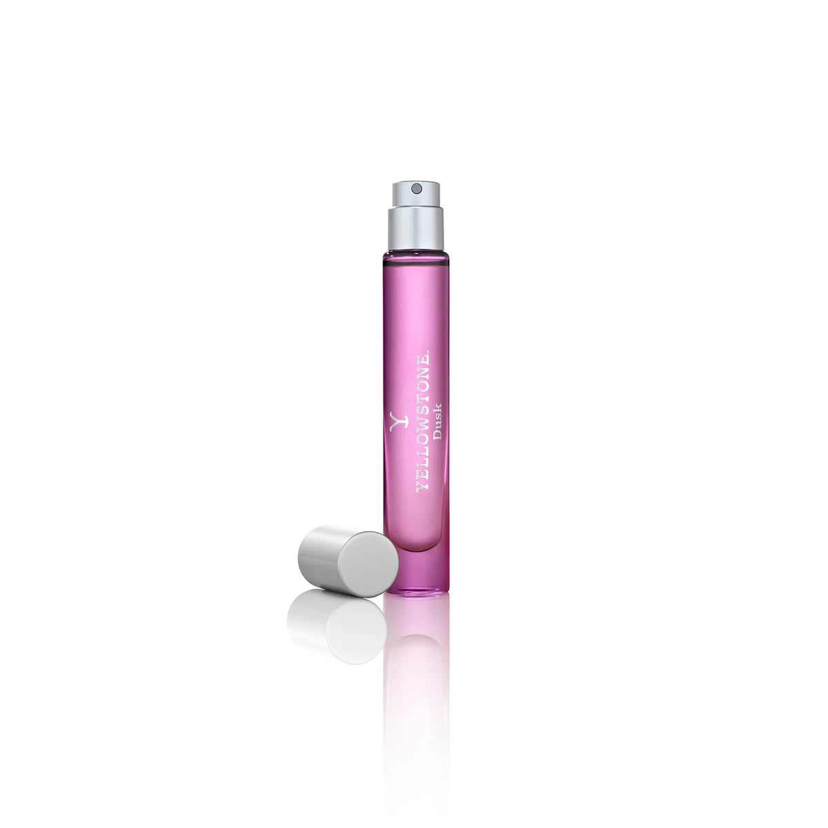Pink spray bottle with silver cap on a white background