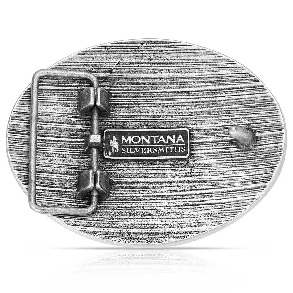 Silver belt buckle with 'Montana Silversmiths' logo on a white background