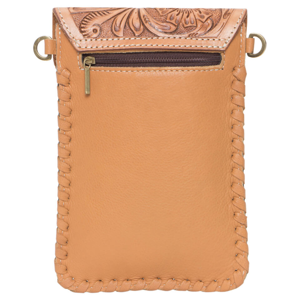 Women's Tooling Cowhide Phone Bag. A brown and white cowhide leather phone bag with hand tooling details, a magnetic closure, and a detachable leather tassel. It includes a shoulder strap and zipper back panel.