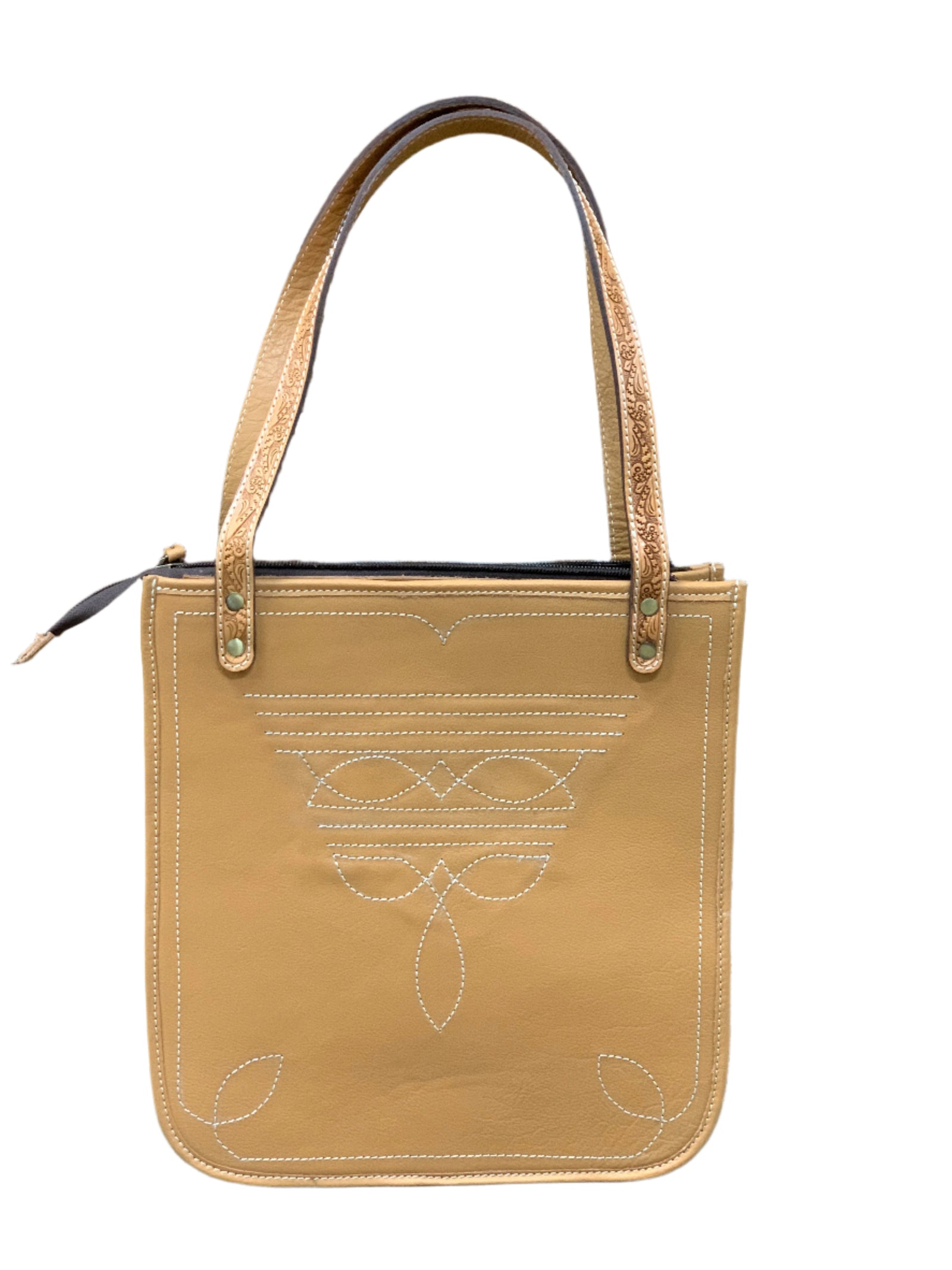 Women's Edmond Leather Boot Stitch Handbag. A brown leather handbag with white boot stitch details and hand carving on the straps, featuring a zippered closure and a shoulder strap.