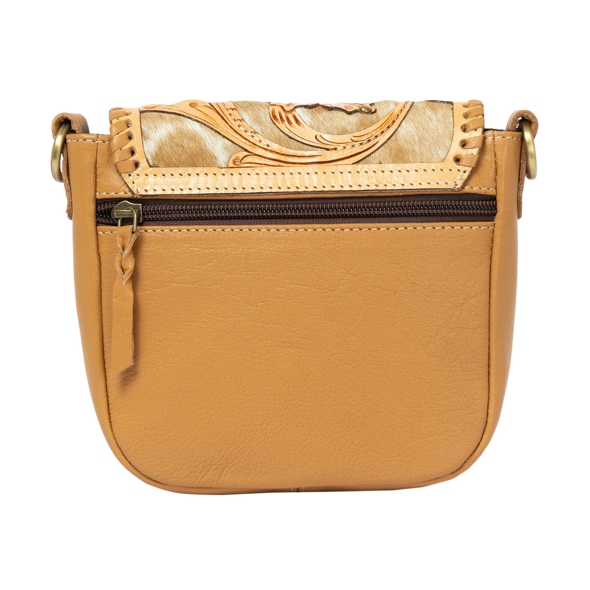 Tan leather crossbody bag with decorative top flap on a white background