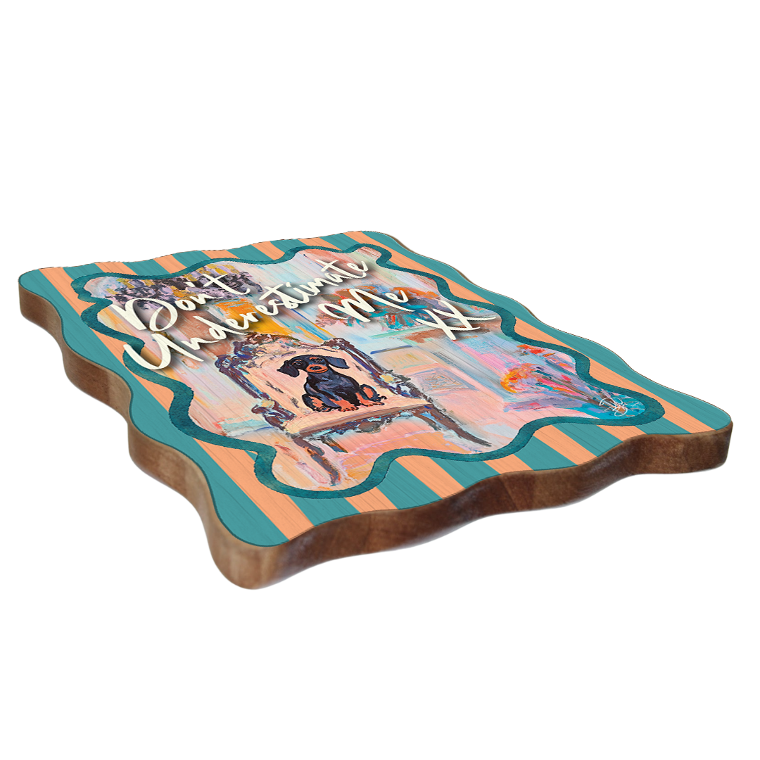 DWBH Don't Underwstimate Me xx Wooden Artwork. Decorative cutting board with artistic design and text on a white background