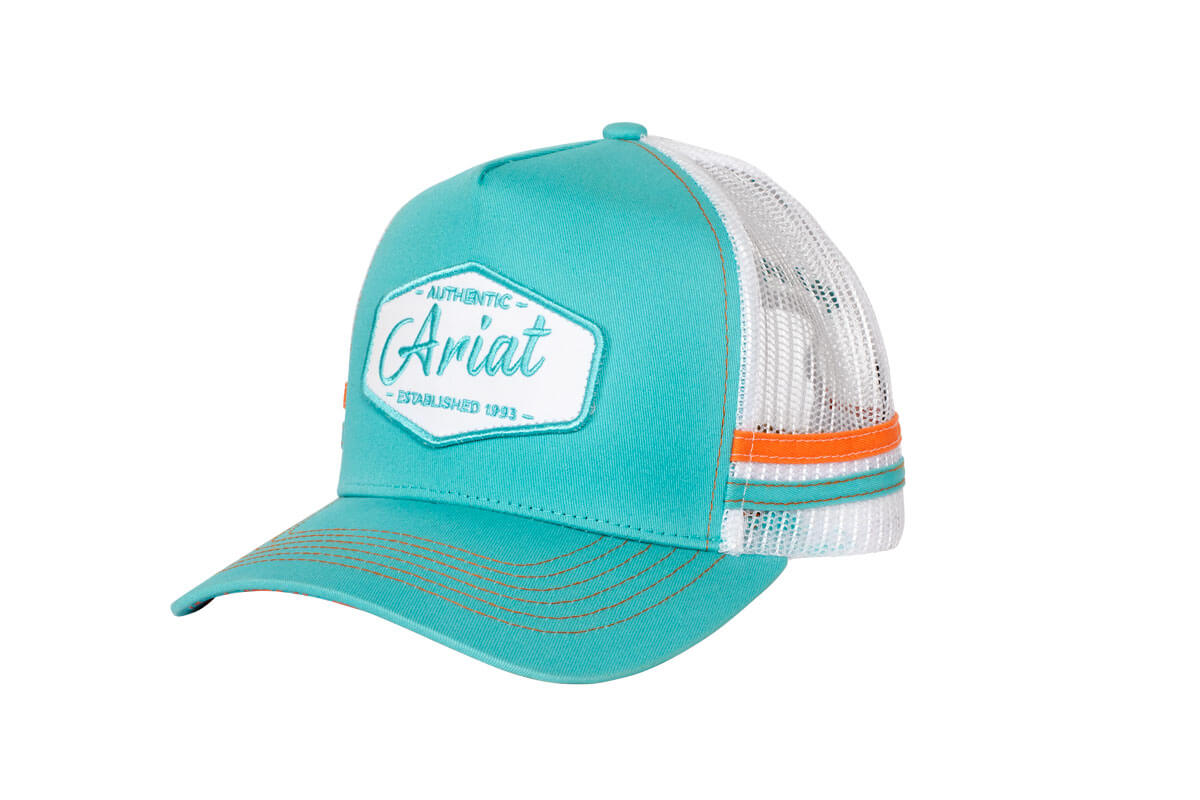Ariat Women's Est Patch Trucker Cap. Teal cap with white mesh back and orange stripe, featuring Ariat logo.