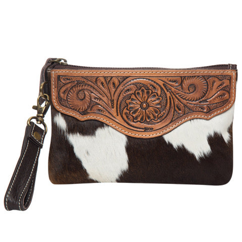 Para Tooling Leather Cowhide Clutch. Cowhide clutch with intricate leather tooling on a white background