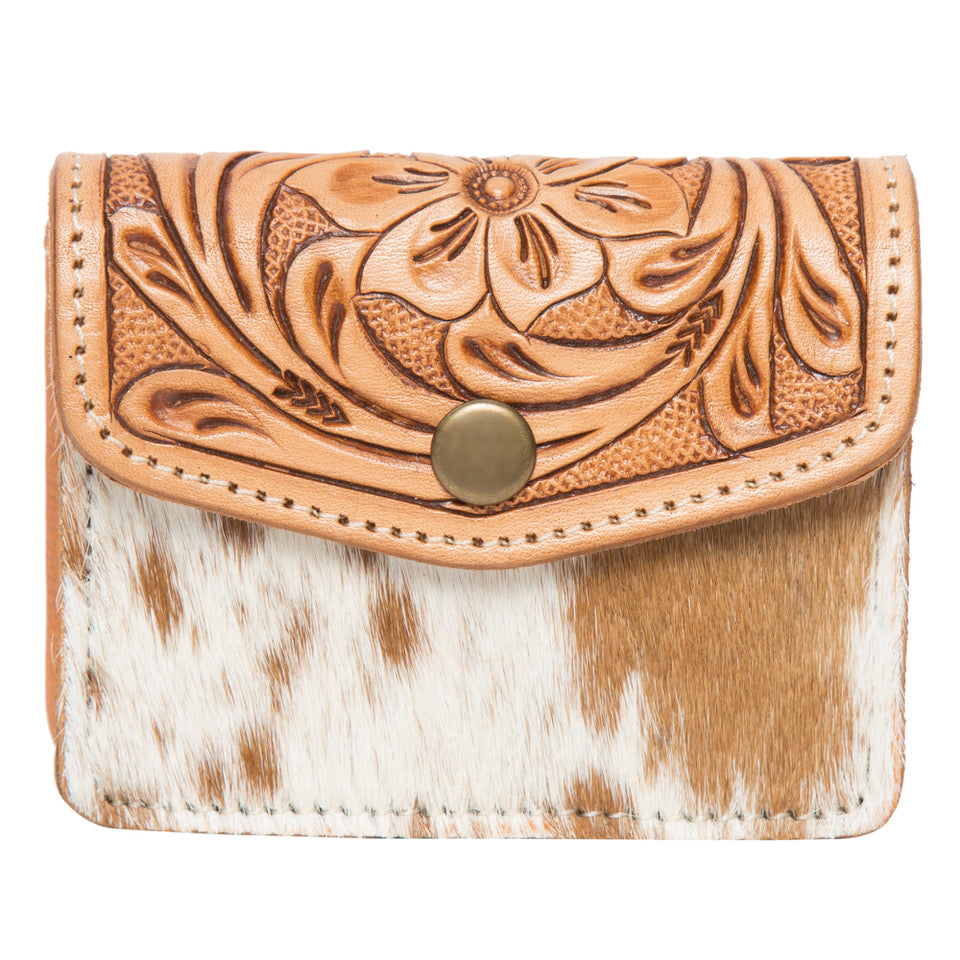 Chile Tooling Leather Cowhide Purse. Leather wallet with floral tooling and cowhide pattern on a white background