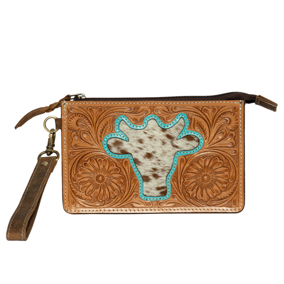 The Design Edge Women's Bullhead Clutch. Brown leather wallet with cowhide design and turquoise accents on a white background.