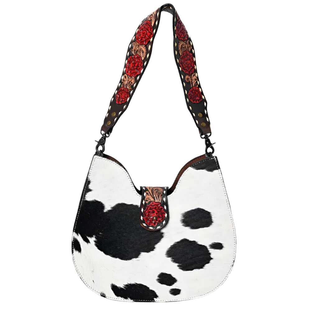 American Darling Cow hide western handbag with decorative tooled roses strap on a white background