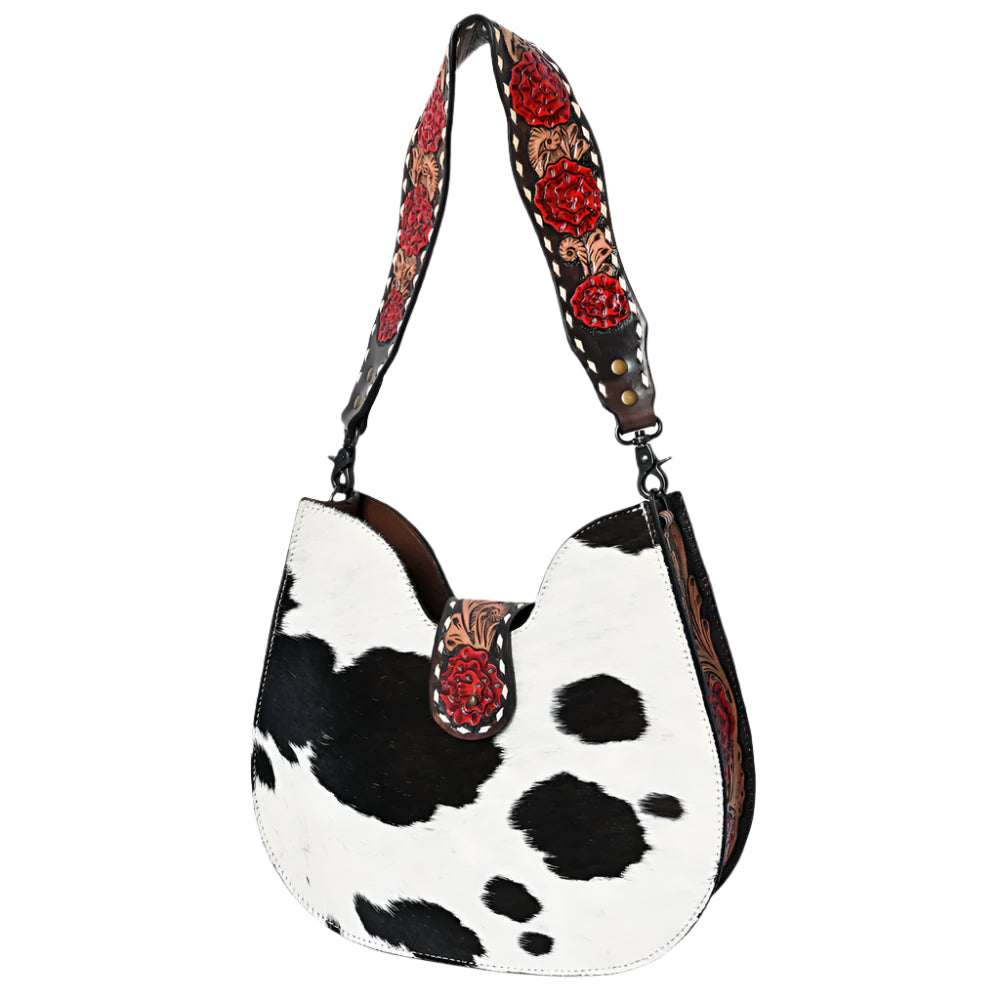 American Darling Cow hide western handbag with decorative tooled roses strap on a white background