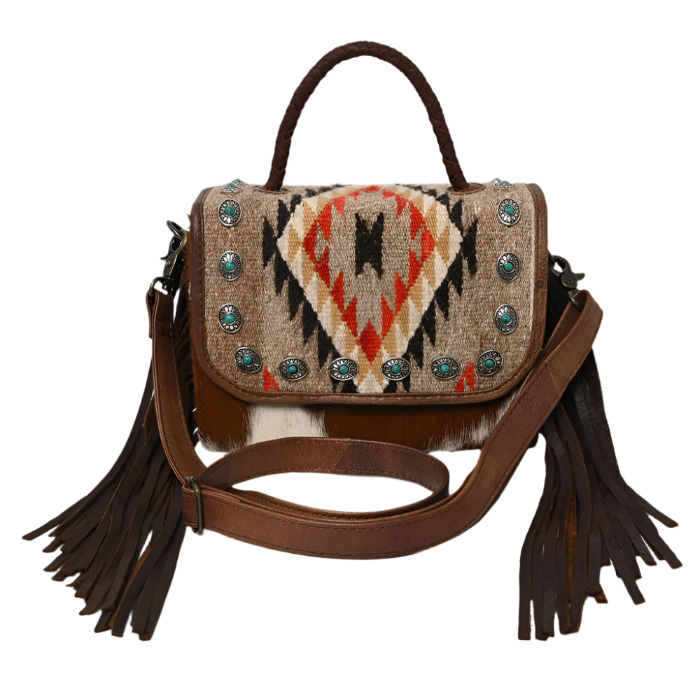 American Darling  brown leather crossbody bag with a western saddle blanket design, featuring fringe detailing and a shoulder strap.
