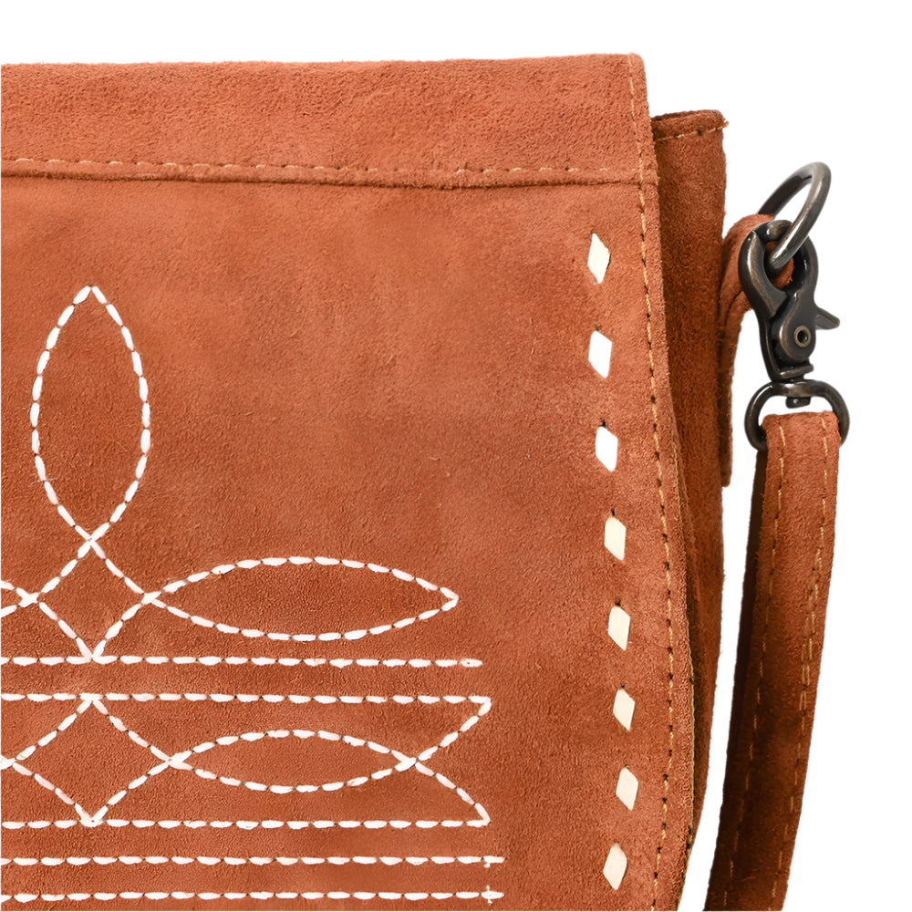 American Darling suede brown leather bag with white stitching details on a white background
