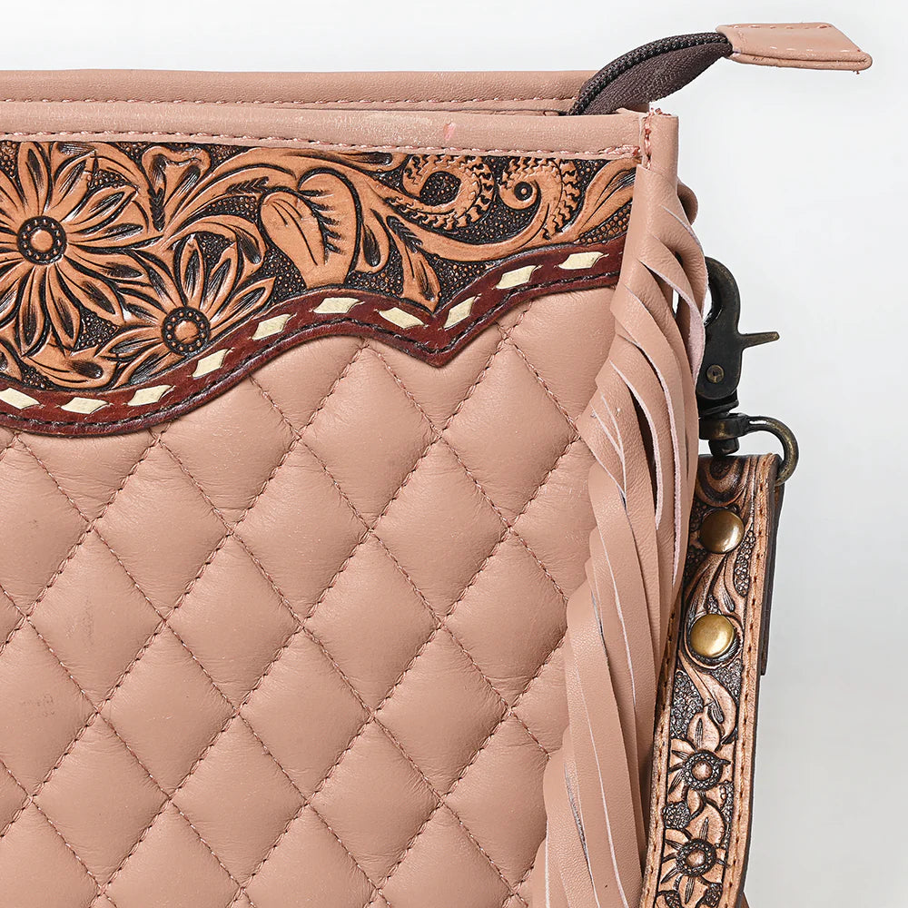 American Darling Pink Quilted Crossbody Western Bag. Close-up of a quilted leather bag with intricate tooled designs on a white background