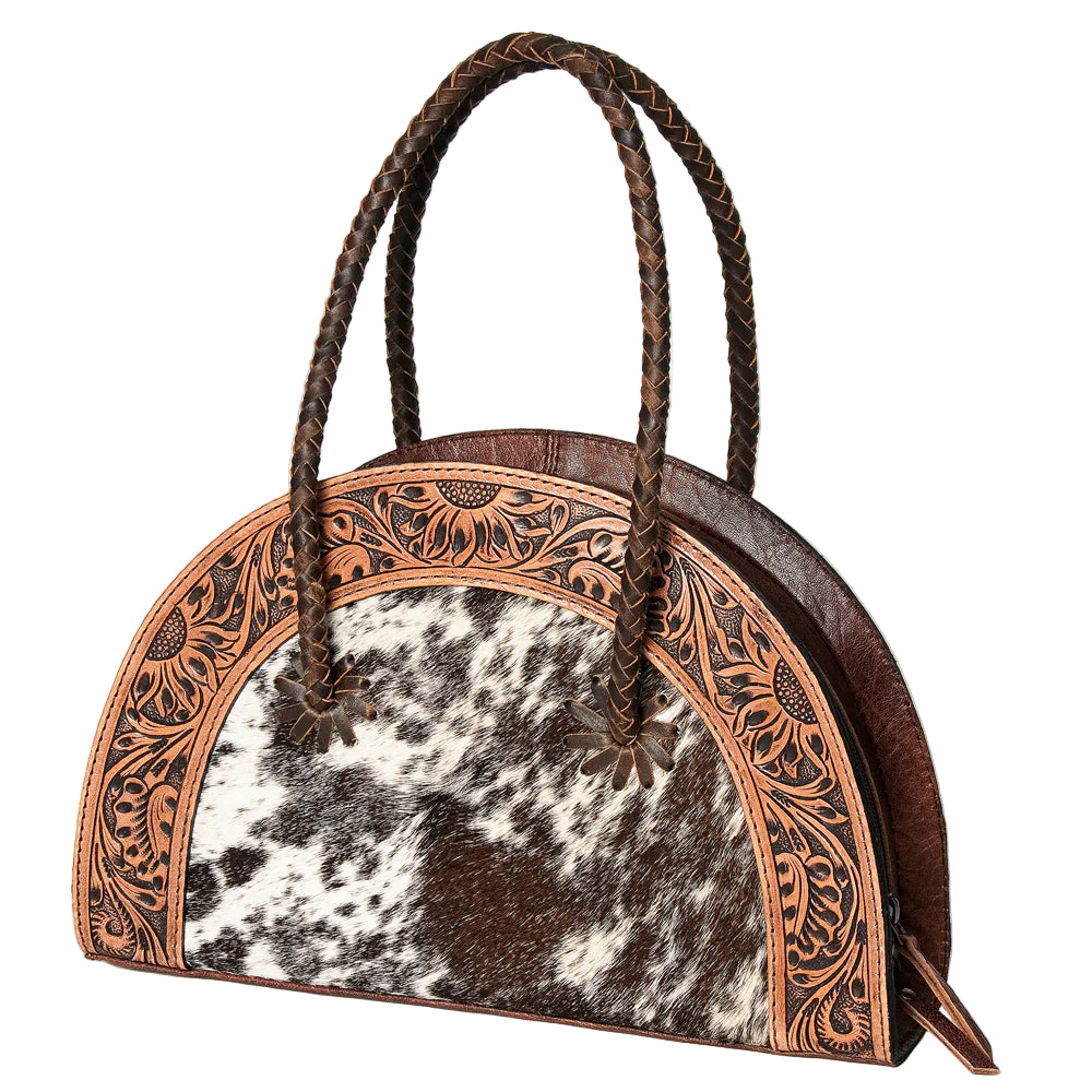 American Darling Tooled &amp; Hide Western Tote. Handbag with cowhide pattern and intricate leatherwork on a white background